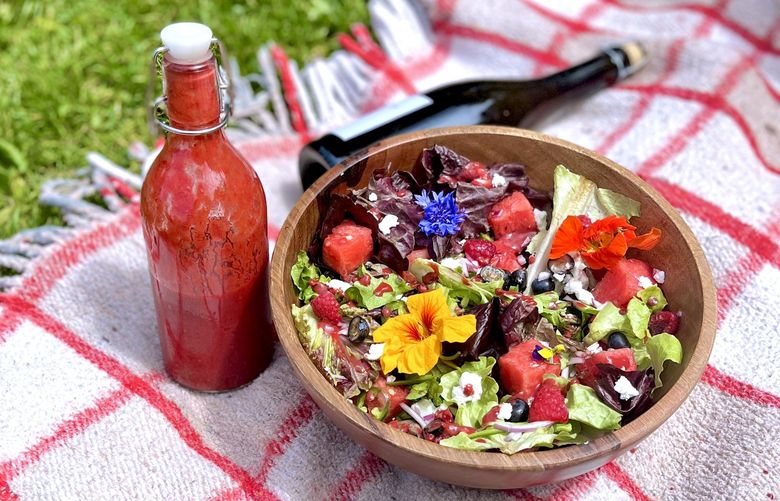This watermelon salad with raspberry vinaigrette is perfect for an outdoor picnic, barbecue, or as a starter to any meal.