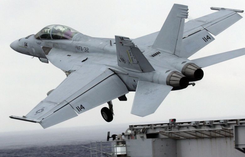 An F/A 18 Super Hornet is launched off the deck of the nuclear-powered aircraft carrier Harry S. Truman  for a fly off at sea off the coast of North Carolina, Monday  Sept. 21, 2009. The ship was participating in a Joint Task Force Exercise in preparation for deployment to Afghanistan. (AP Photo/Steve Helber)