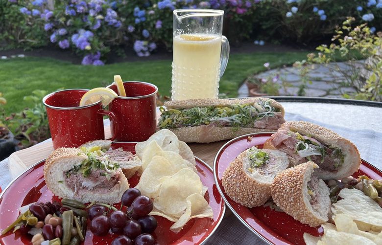 The sandwich, prepared by Ben Campbell, owner of Ben’s Bread, may be the star of this picnic, but the accompaniments are important as well. Weather is always an issue, so pack goodies accordingly â€¦ and don’t forget the chips. Credit: David MIller / The Seattle Times
