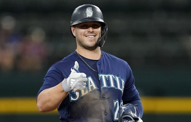 Seattle Mariners’ Ty France celebrates his double in the ninth inning of a baseball game against the Texas Rangers, Saturday, July 16, 2022, in Arlington, Texas. (AP Photo/Tony Gutierrez) TXTG117 TXTG117