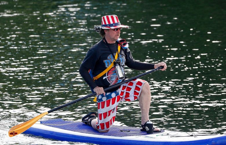 South Lake Union – Fourth of July – 070422

A patriotic paddle boarder slices his way through Lake Union before the start of the Fourth of July fireworks Monday, July 4, in Seattle, Wash. 220898