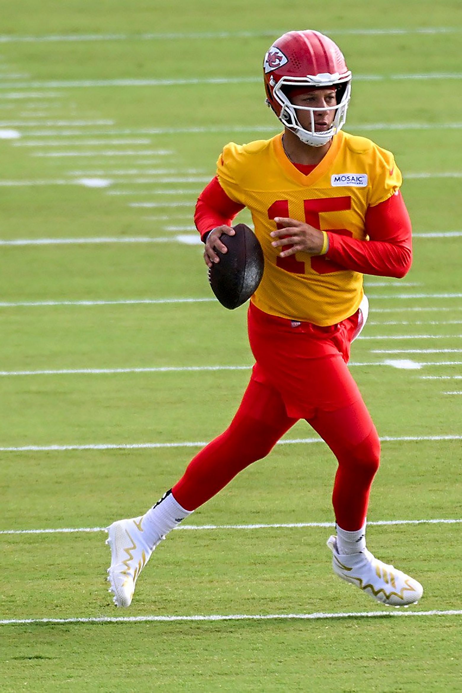 Kansas City Chiefs defensive end Carlos Dunlap puts his helmet on in  preparation for entering the game against the Los Angeles Rams during the  second half of an NFL football game, Sunday