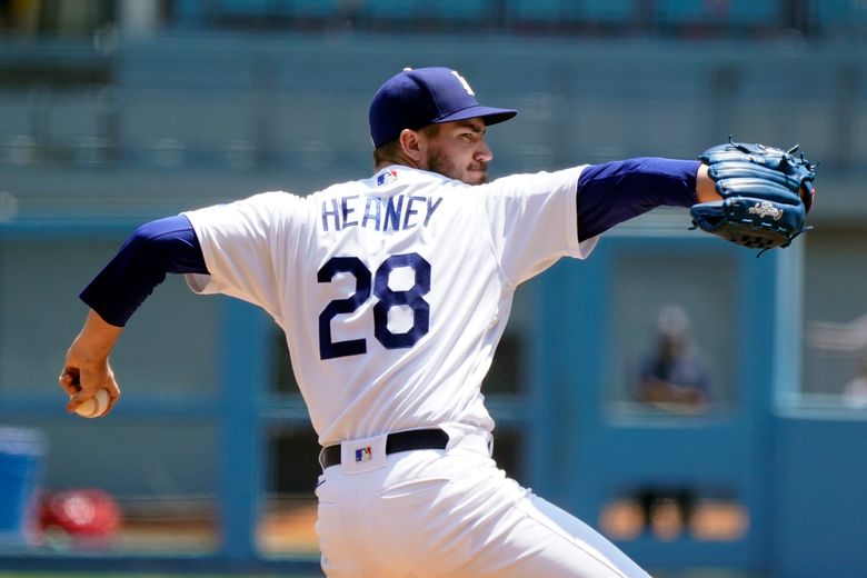 Los Angeles Dodgers second baseman Hanser Alberto (17) throws to