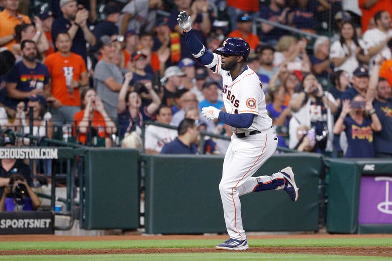 Yordan Alvarez signs home run baseball for fan who caught it