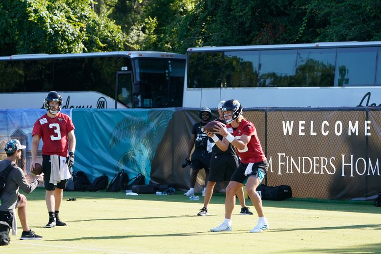 Bus bond: Jags open camp with police escort to high school