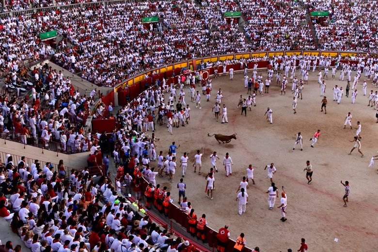 Spain's running of the bulls: 6 hurt, no gorings in Pamplona | The Seattle  Times