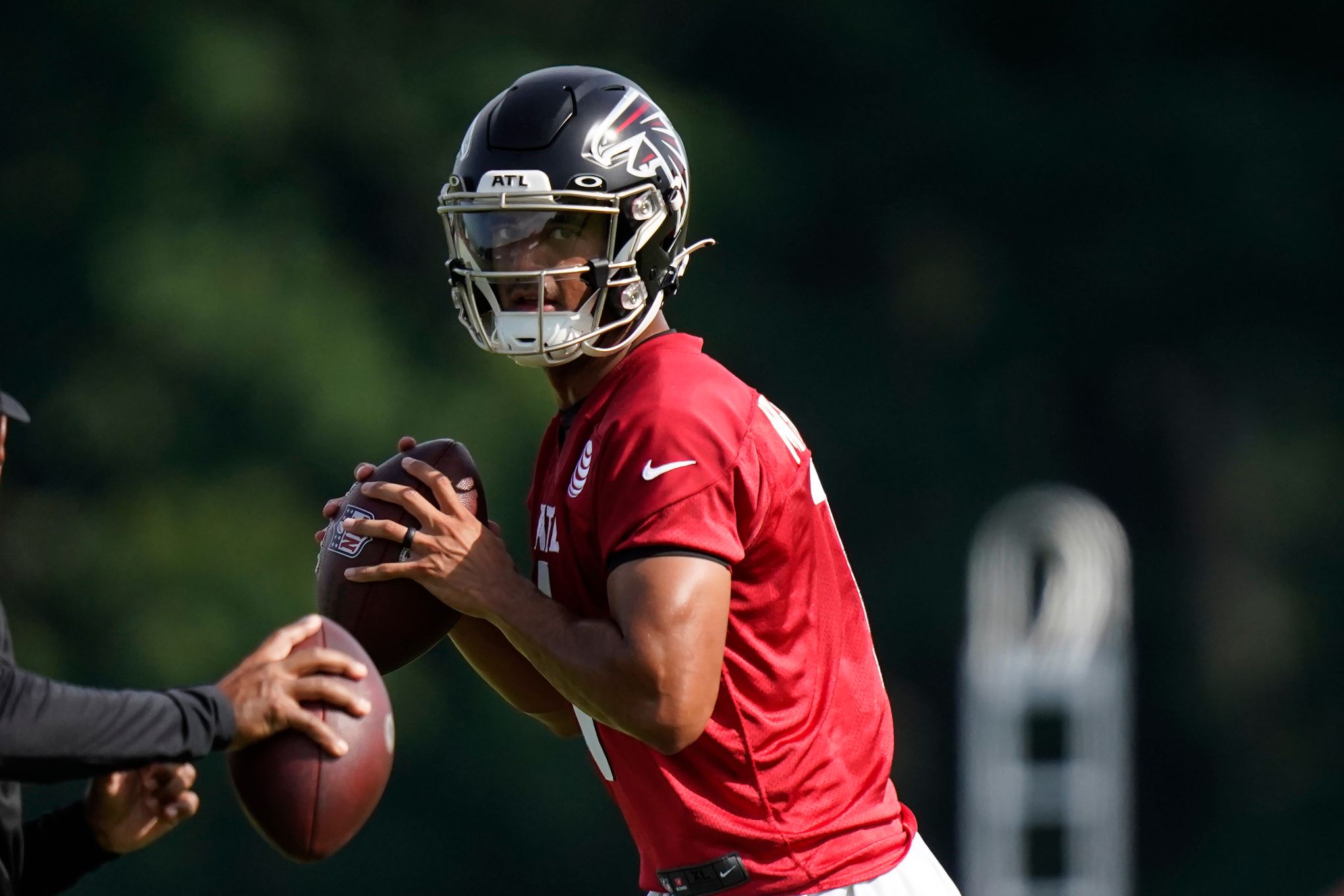 Falcons open camp with low expectations, open positions