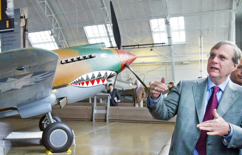 Paul Allen tours the Flying Heritage Collection at Paine Field, on the opening day in 2008.  At left is an American-made P40 Tomahawk. 0405524316