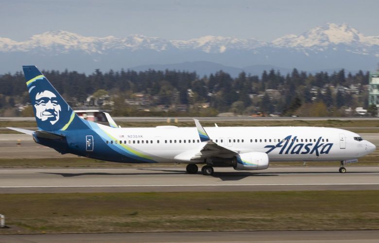 An Alaska Airlines jet takes off at Seattle-Tacoma International Airport in SeaTac Thursday, April 7, 2022.  Expansion plans at Alaska Airlines have been hit by the reality of staff shortages and travel chaos. 220071