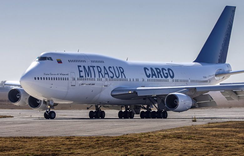 FILE – A Venezuelan-owned Boeing 747, operated by Venezuela’s state-owned Emtrasur cargo line, taxis on the runway after landing in the Ambrosio Taravella airport in Cordoba, Argentina, June 6, 2022. On Aug. 1, 2022, an Argentine judge upheld a ban on the plane and its crew of Venezuelans and Iranians from leaving the country. (AP Photo/Sebastian Borsero, File) XLAT170 XLAT170