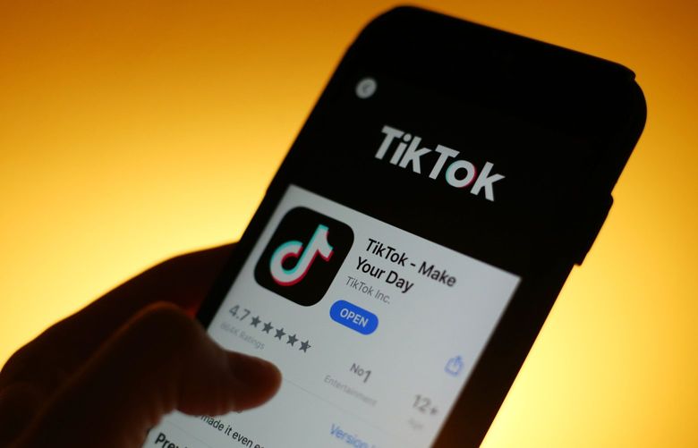 The TikTok app is displayed in the app store on a smartphone in this arranged photograph in London, U.K., on Monday, Aug. 3, 2020. TikTok has become a flash point among rising U.S.-China tensions in recent months as U.S. politicians raised concerns that parent company ByteDance Ltd. could be compelled to hand over American users’ data to Beijing or use the app to influence the 165 million Americans, and more than 2 billion users globally, who have downloaded it.