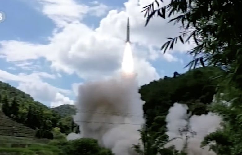 In this image taken from video footage run by China’s CCTV, a projectile is launched from an unspecified location in China, Thursday, Aug. 4, 2022. China says it conducted “precision missile strikes” in the Taiwan Strait on Thursday as part of military exercises that have raised tensions in the region to their highest level in decades. (CCTV via AP) XBEJ802 XBEJ802