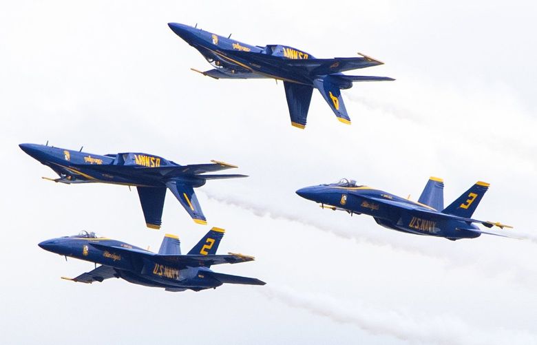 The Blue Angels pass over Lake Washington near the I-90 floating bridge during a practice Thursday, August 4, 2022.   They are scheduled to perform for Seafair through the weekend. 221181