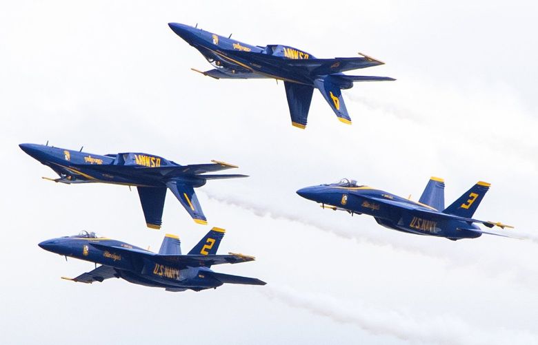 The Blue Angels pass over Lake Washington near the I-90 floating bridge during a practice Thursday, August 4, 2022. They are scheduled to perform for Seafair through the weekend. 221181