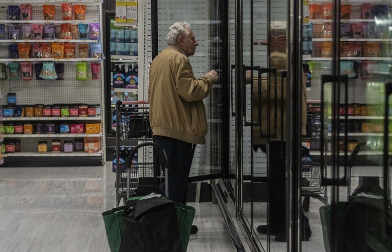 FILE — A convenience store in Manhattan, July 13, 2022. If the U.S. is in a recession it is unlike any previous one: employers added more than half a million jobs in July and the unemployment rate is at a half-century low. (Hiroko Masuike/The New York Times) XNYT16 XNYT16