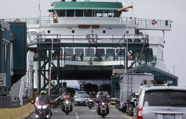 The M/V Puyallup unloads in Edmonds, Tuesday, Aug. 31, 2021. Washington State Ferries cruise toward a rocky Labor Day weekend, as chronic crew shortages are worsened by COVID-19.