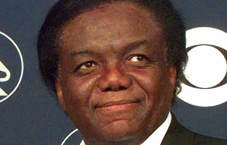 FILE – Songwriter/producer Lamont Dozier appears at the 40th Annual Grammy Awards in New York on Feb. 25, 1998. Dozier, of the celebrated Holland-Dozier-Holland team that wrote and produced â€œYou Canâ€™t Hurry Love,â€ â€œHeat Waveâ€ and dozens of other hits and helped make Motown an essential record company of the 1960s and beyond, has died at age 81.  (AP Photo/Richard Drew, File) NYET202 NYET202