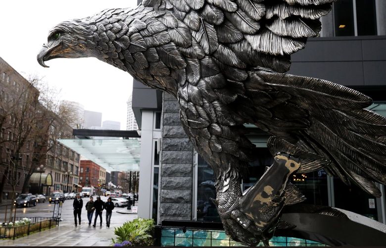 “Splashdown,” Chester Fields’ stainless steel eagle sculpture, dominates the entrance to the Avalara Hawk Tower on South King Street in Seattle. In its talons is a trout. 

