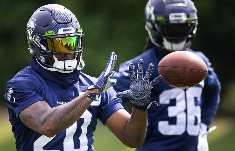 Running back Rashaad Penny pulls down a pass during practice Monday.

The Seattle Seahawks held fall camp Monday, August 1, 2022 at the VMAC in Renton, WA. 221119