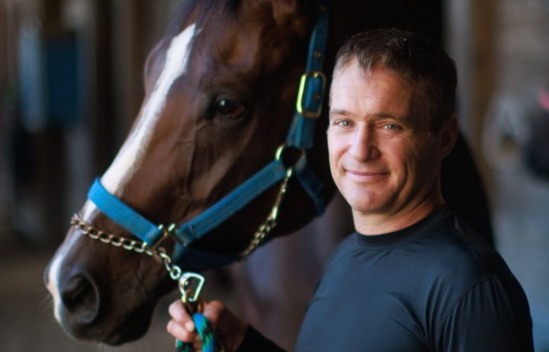 Jockey Kevin Radke is photographed with horse Papa’s Golden Boy at Emerald Downs in Auburn, Wash. Monday, August 8, 2022. 221206