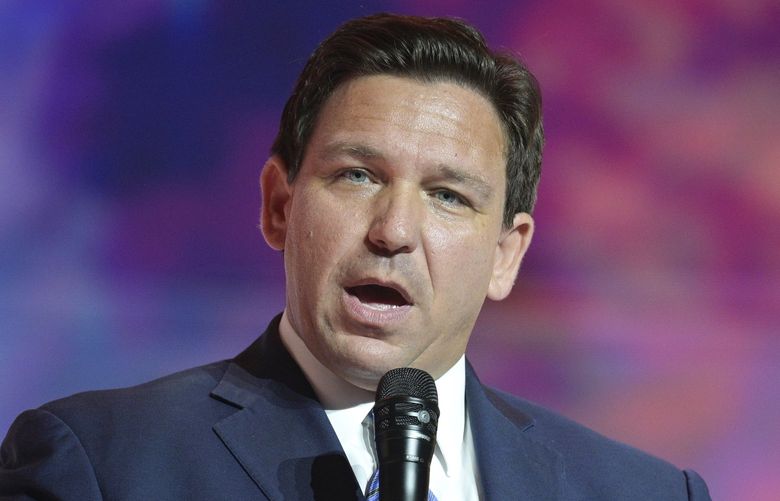 FILE – Florida Gov. Ron DeSantis addresses attendees during the Turning Point USA Student Action Summit, July 22, 2022, in Tampa, Fla. Florida Gov. Ron DeSantis, who likely represents former President Donald Trump’s strongest potential primary challenger, described the Biden administration as a â€œregimeâ€ and called the Mar-a-Lago search â€œanother escalation in the weaponization of federal agencies against the Regimeâ€™s political opponents.â€ (AP Photo/Phelan M. Ebenhack, File) WX105 WX105