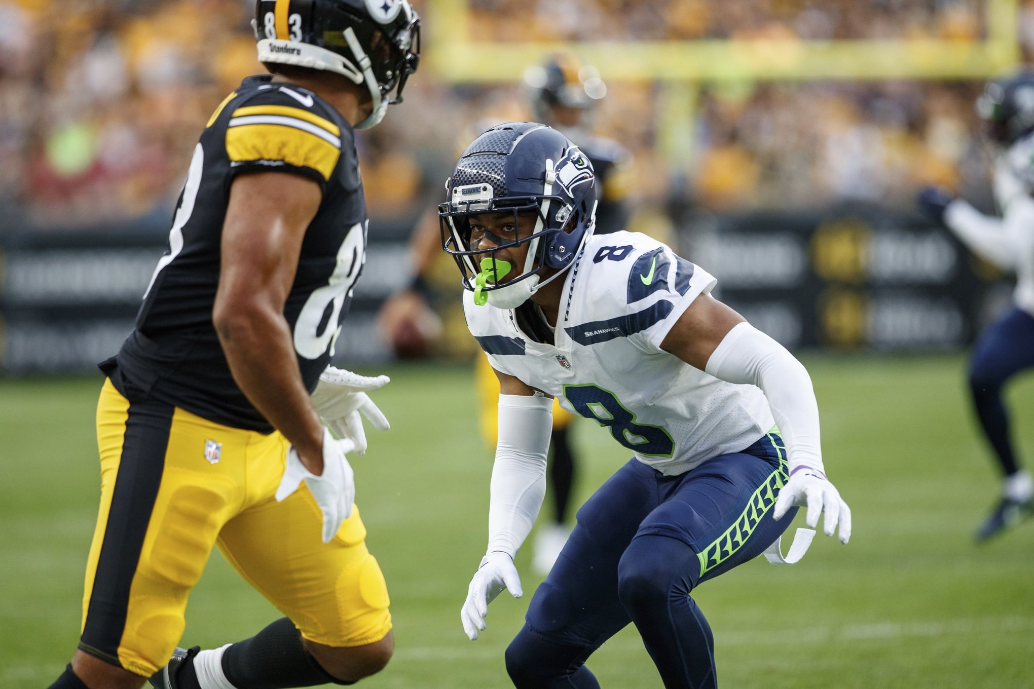 Seattle Seahawks cornerback Tariq Woolen (27) warms up before an NFL  football game against the Carolina