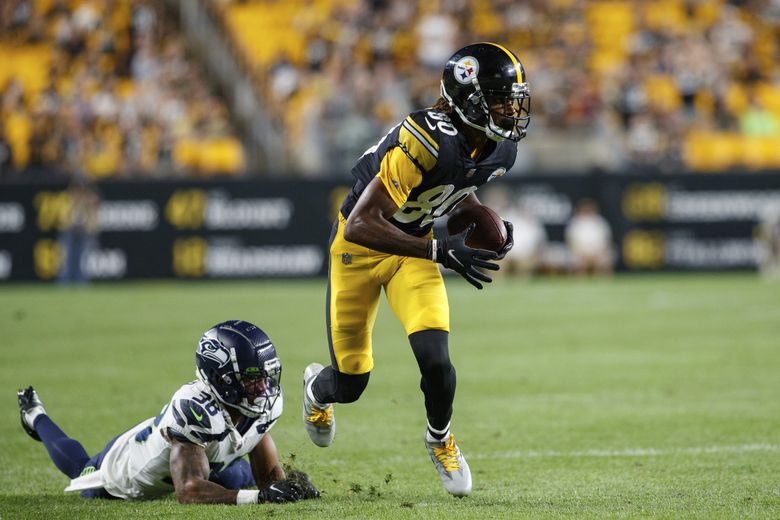 Quarterback play a mixed bag as Seahawks lose to Steelers to open
