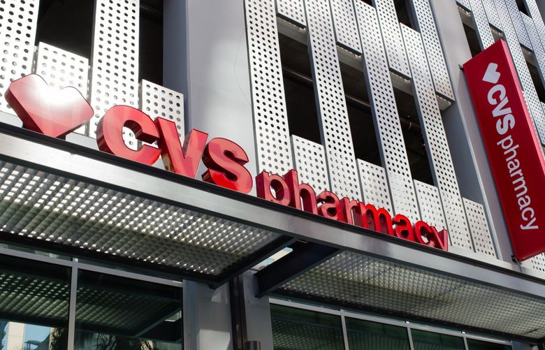 CVS Health Corp. signage is displayed outside a store in downtown Los Angeles, California, U.S., on Friday, Oct. 27, 2017. The prospect of Amazon.com Inc. entering the healthcare business is beginning to cause far-reaching reverberations for a range of companies, roiling the shares of drugstore chains, drug distributors and pharmacy-benefit managers, and potentially precipitating one of the biggest corporate merger deals this year.