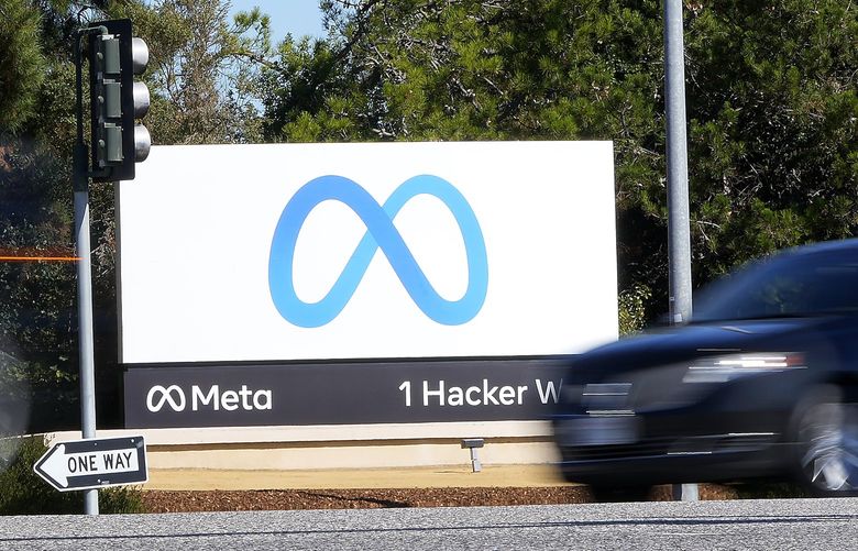 Facebook unveiled their new Meta sign at the company headquarters in Menlo Park, Calif., Thursday, Oct. 28, 2021. Facebook Inc. announced Thursday that it is changing its name to Meta Platforms Inc., joining a long list of companies that have tried to rebrand themselves over the years. (AP Photo/Tony Avelar) CATA101 CATA101