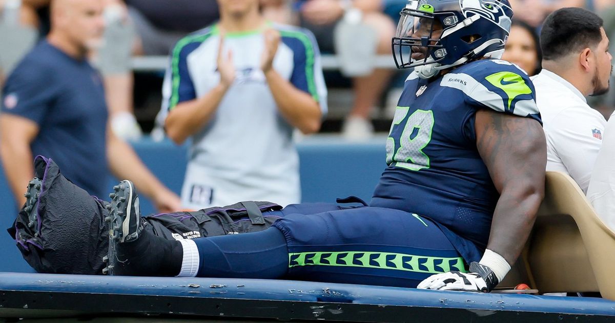 Seahawks guard Damien Lewis escapes serious injury after being carted off  field vs. Bears