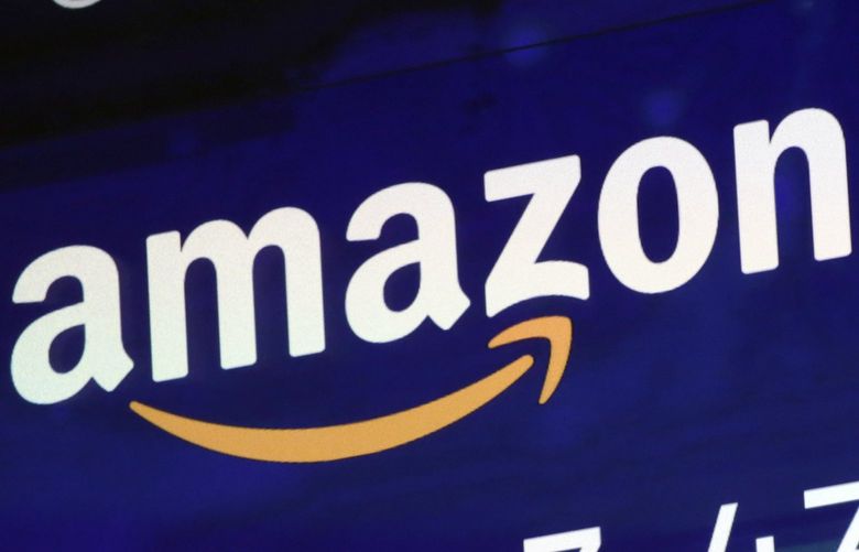 FILE – A logo for Amazon is displayed on a screen at the Nasdaq MarketSite, July 27, 2018.  (AP Photo/Richard Drew, File) 