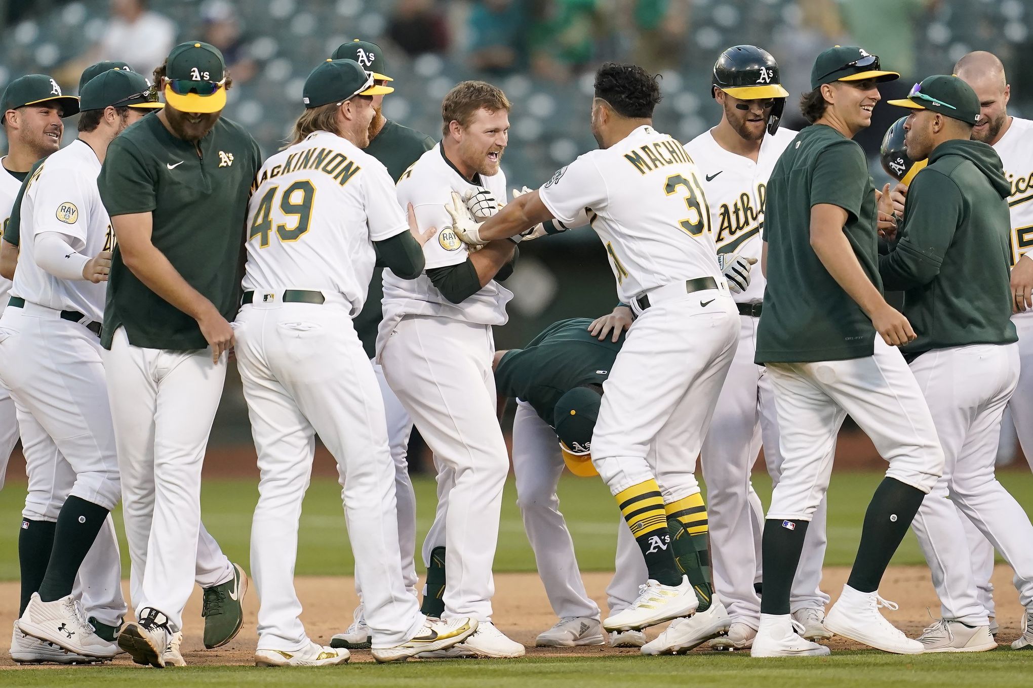 Oakland Athletics' Cal Stevenson runs to first base after earning