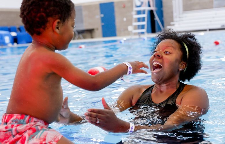 Rainier Beach Community Center & Pool – Dance and Splash – 081322

Jazmyne Fosha catches her two-and-a-half year old son Micah as he slides into the water during Dance and Splash at the Rainier Beach pool Saturday, Aug. 13, 2022, in Seattle, Wash. 221272