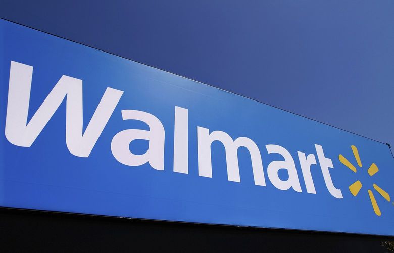 The Walmart logo is displayed on a store. (AP Photo/Seth Perlman, File) 