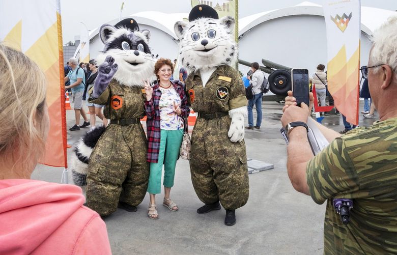 Entertainers at a military expo at a Moscow park on Aug. 20. Russian authorities have promoted many festivals and pro-Kremlin concerts this summer.