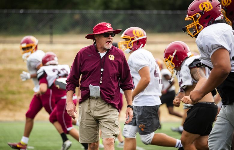 Head coach Monte Kohler directs football practice for O’Dea High School at Genesee Park in Seattle Thursday August 26, 2021. 218034