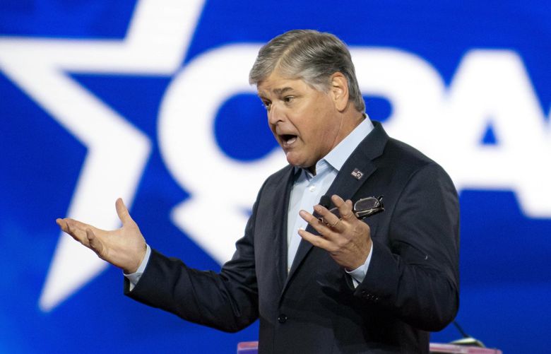 FILE – Sean Hannity speaks at the Conservative Political Action Conference (CPAC) in Dallas on Aug. 4, 2022. Hannity is the latest Fox star to be called for a deposition by  lawyers representing Dominion Voting Systems in its $1.6 billion defamation suit against the network. (Emil Lippe/The New York Times) XNYT73 XNYT73