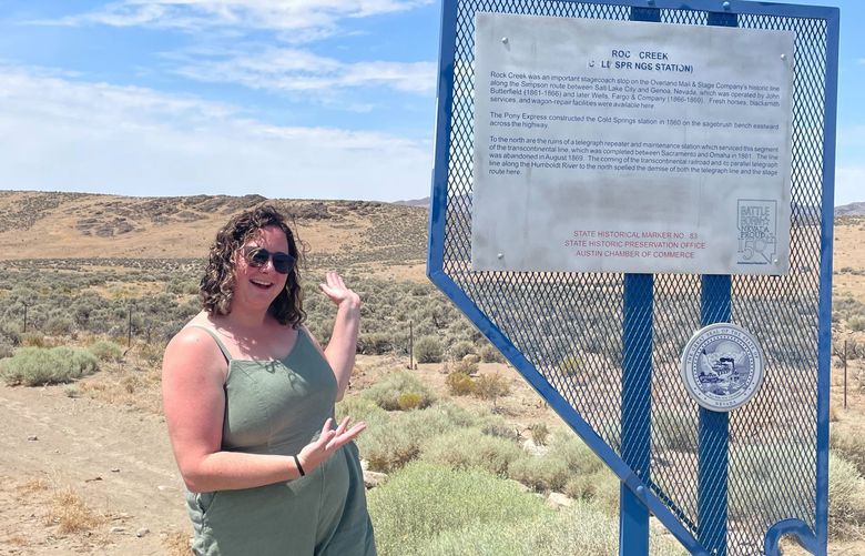 Rachel Lerman next to a Nevada shaped Nevada info sign on July 31, 2022 near Austin, Nevada. MUST CREDIT: Washington Post photo by Rachel Lerman