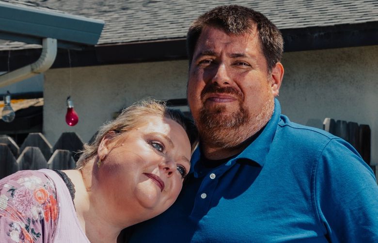 Lori Long and her fiancee Mark Contreras, for whom getting married would mean losing the Medicaid benefit that she relies on to navigate life with ankylosing spondylitis, at their home in Salinas, Calif. on June 11, 2022. “When they wrote the Social Security laws, they weren’t thinking that young people with disabilities would ever be marriage material,” Long said. (Clara Mokri/The New York Times) XNYT56 XNYT56
