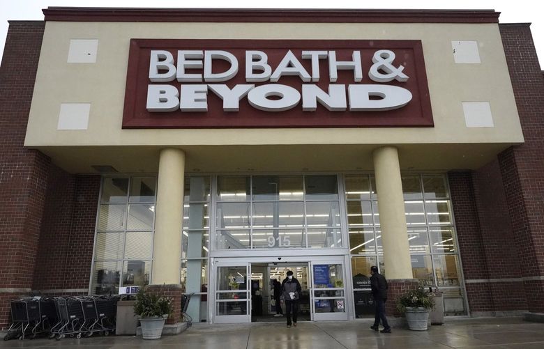 Shoppers enter and exit a Bed Bath & Beyond in Schaumburg, Ill., Jan. 14, 2021. (AP Photo/Nam Y. Huh, File) 
