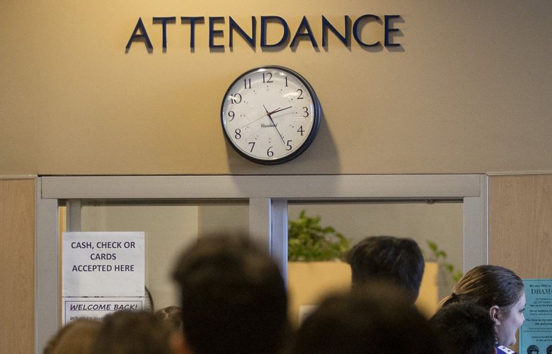 Students wait to purchase ASB cards, parking permits, and more school necessities during Bothell High School’s Back-to-School Fair in Bothell, Wash. on Monday, Aug. 29, 2022.