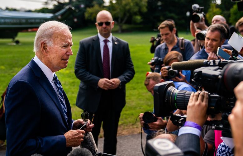 President Joe Biden speaks with the press on the South Lawn of the White House on Aug. 26, 2022, in Washington, D.C. MUST CREDIT: Washington Post photo by Demetrius Freeman