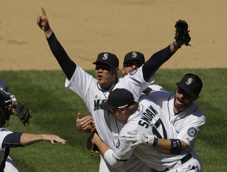 Felix Hernandez celebrates after pitching a perfect game at Safeco Field against Tampa Bay Weds., Aug. 12, 2012. It remains the only perfect game in Mariner history.  (Mark Harrison / The Seattle Times, 2012)