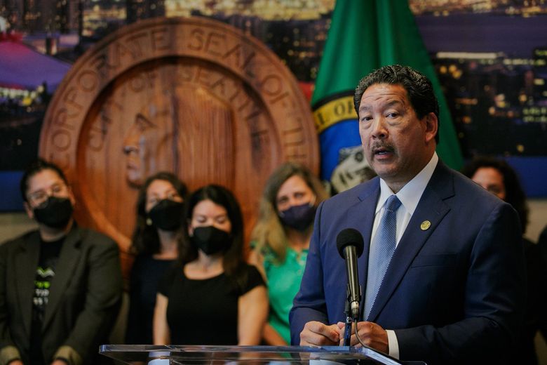 Seattle Mayor Bruce Harrell speaks during a news conference at City Hall on Monday morning, calling the spate of weekend shootings “just unacceptable.” (Kori Suzuki / The Seattle Times)