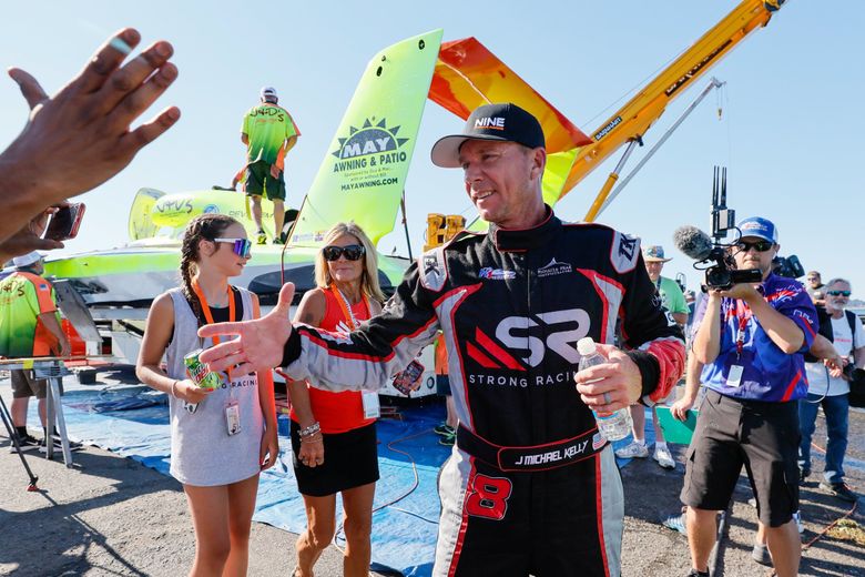 J. Michael Kelly is congratulated by people after winning the HomeStreet Bank Cup on Sunday. (Jennifer Buchanan / The Seattle Times)