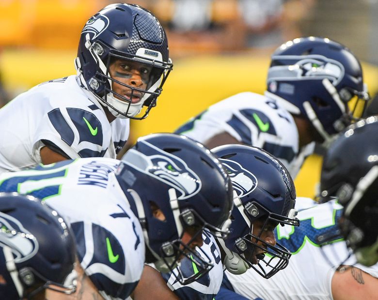 Seattle Seahawks quarterback Geno Smith (7) calls signal at the line of scrimmage against the Pittsburgh Steelers during the first half of an NFL preseason football game, Saturday, Aug. 13, 2022, in Pittsburgh. (AP Photo/Barry Reeger) PAKS PAKS