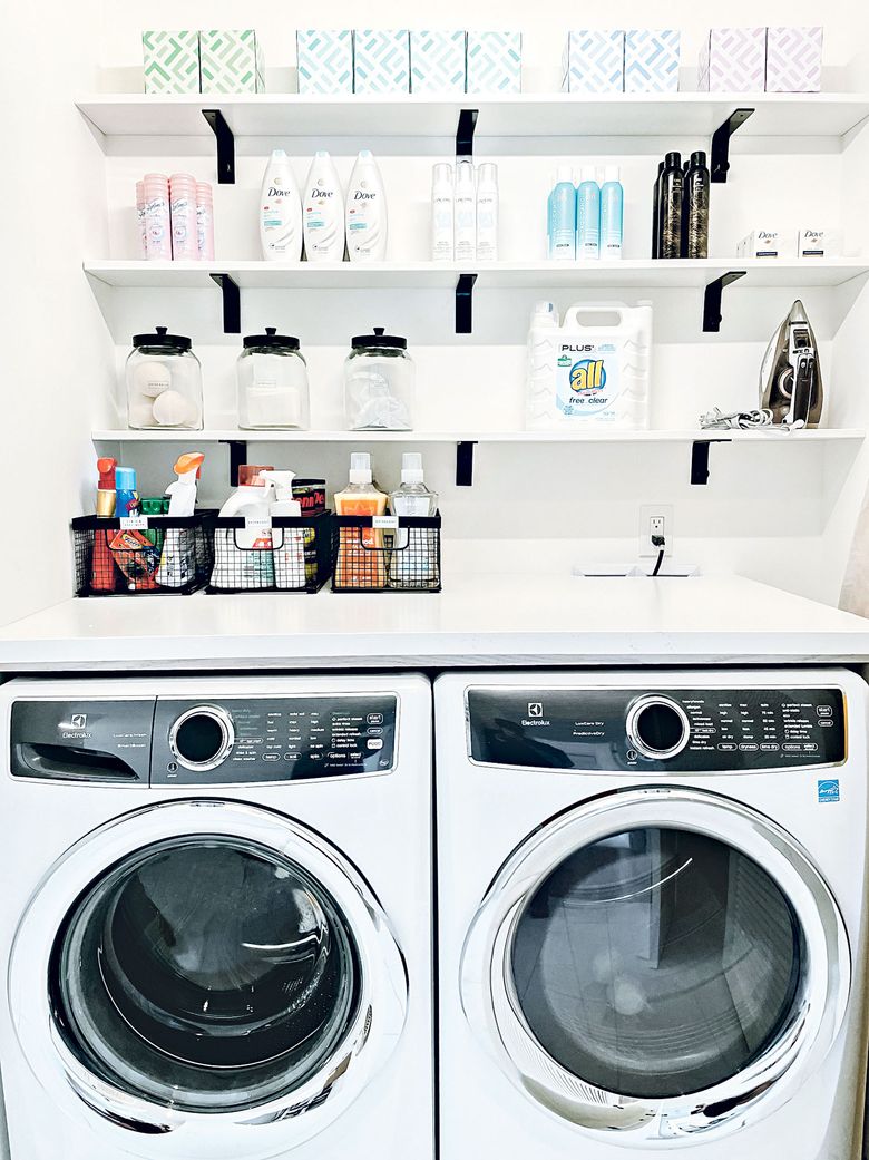 Clean and Organized Laundry Room with Washer and Dryer