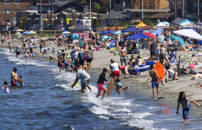 For those opting out of seeing the hydros racing at Seafair Sunday, Aug. 7, 2022, temperatures were noticeably lower at Alki Beach where cooler marine air kept things chill. For those venturing into the water, it was quite a bit cooler.