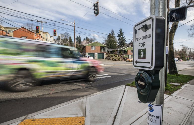 Friday, Feb. 28, 2020. Cars and trucks zoom down Rainier Ave. through the intersection bordered by the Seattle Senior Center on Rainier Ave. and S. Holly Street. 213126