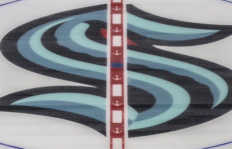 The Kraken logo is located at center ice at Climate Pledge Arena at Seattle Center on Saturday, Oct. 16, 2021. 218527